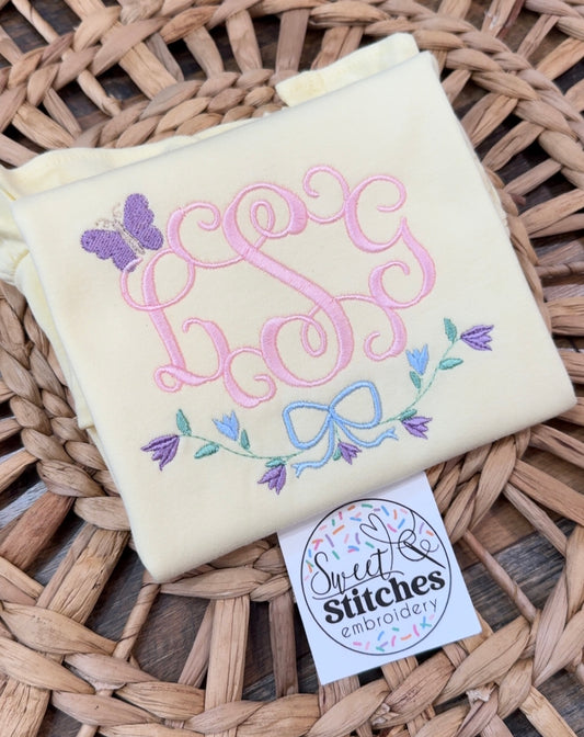 Butterfly with floral crest monogram